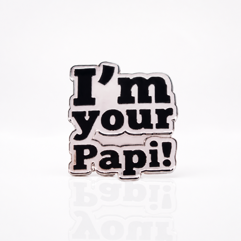 Silver enamel pin reading “I’m Your Papi!”