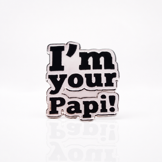 Silver enamel pin reading “I’m Your Papi!”