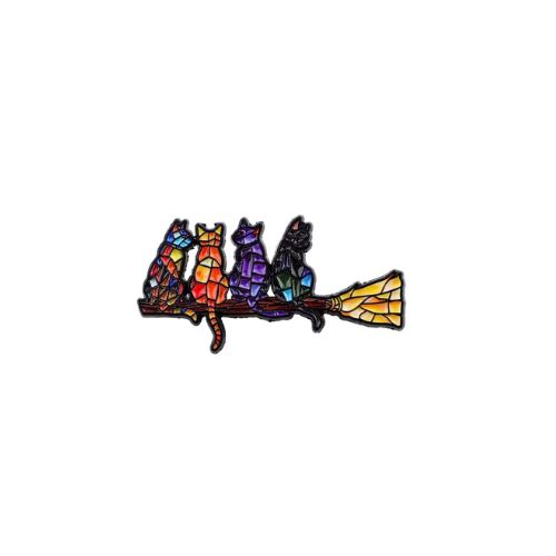 Colorful stained glass style enamel pin featuring cats sitting on a broomstick