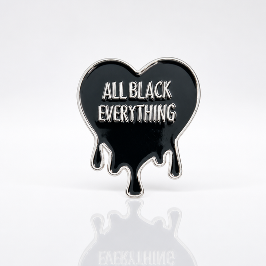 Black dripping heart enamel pin with All Black Everything text 
