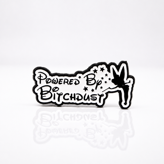 Powered by Bitchdust enamel pin with fairy-inspired magical parody artwork