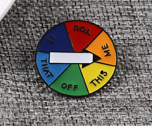 Funny rainbow spinner enamel pin with functional spinning arrow and sarcastic humor design