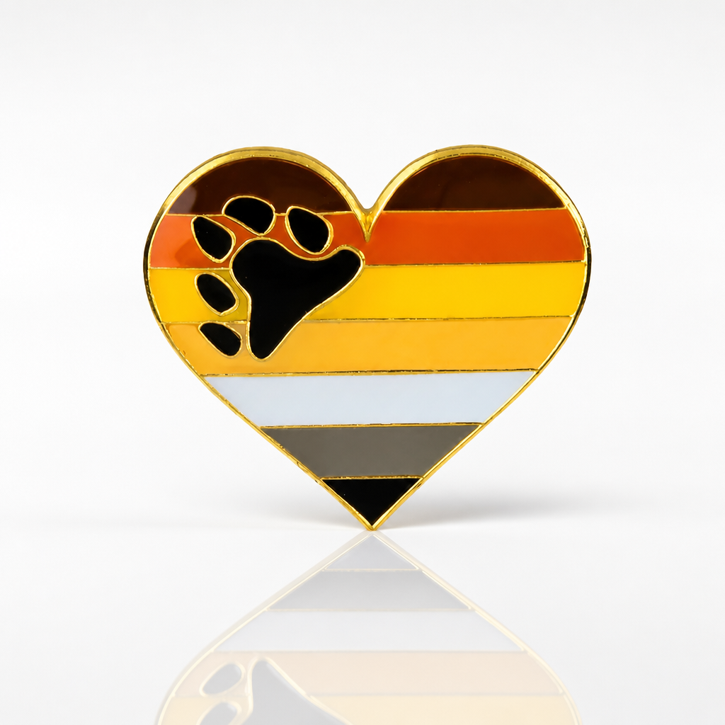 Heart-shaped Bear Brotherhood enamel pin with paw print and bear Pride flag colors