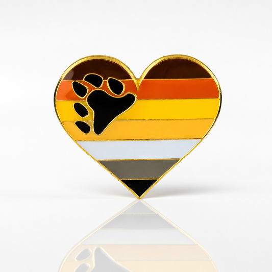 Heart-shaped Bear Brotherhood enamel pin with paw print and bear Pride flag colors