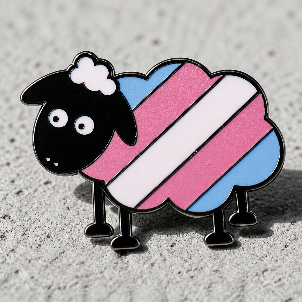 Cute Trans Pride Sheep enamel pin with pastel transgender flag colors on a concrete surface