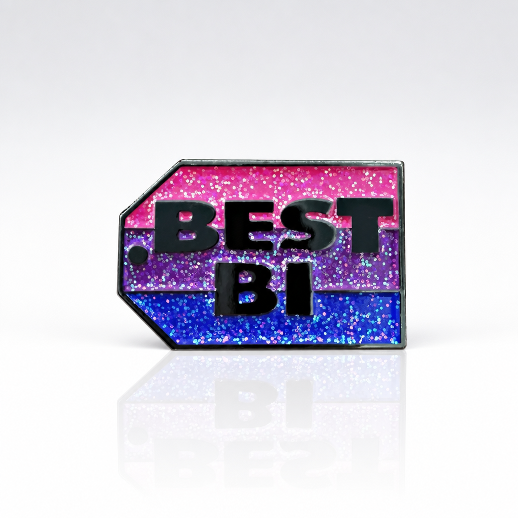 Glitter bisexual Pride enamel pin reading “Best Bi” in bold lettering 