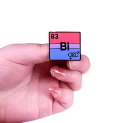 Hand holding a Bisexual pride enamel pin designed like a periodic table element with pink purple and blue flag colors