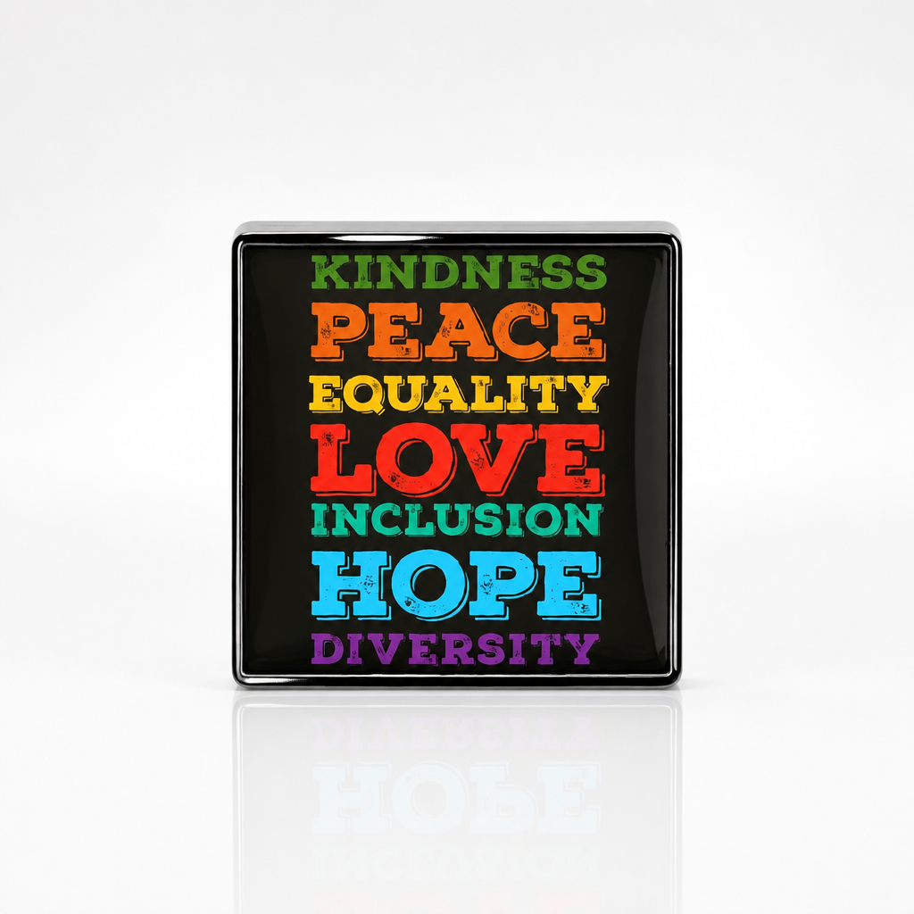 Square enamel pin featuring the words Kindness Peace Equality Love Inclusion Hope and Diversity in colorful lettering