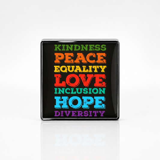 Square enamel pin featuring the words Kindness Peace Equality Love Inclusion Hope and Diversity in colorful lettering