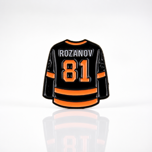 Heated Rivalry Rozanov home jersey enamel pin with black and gold hockey uniform design