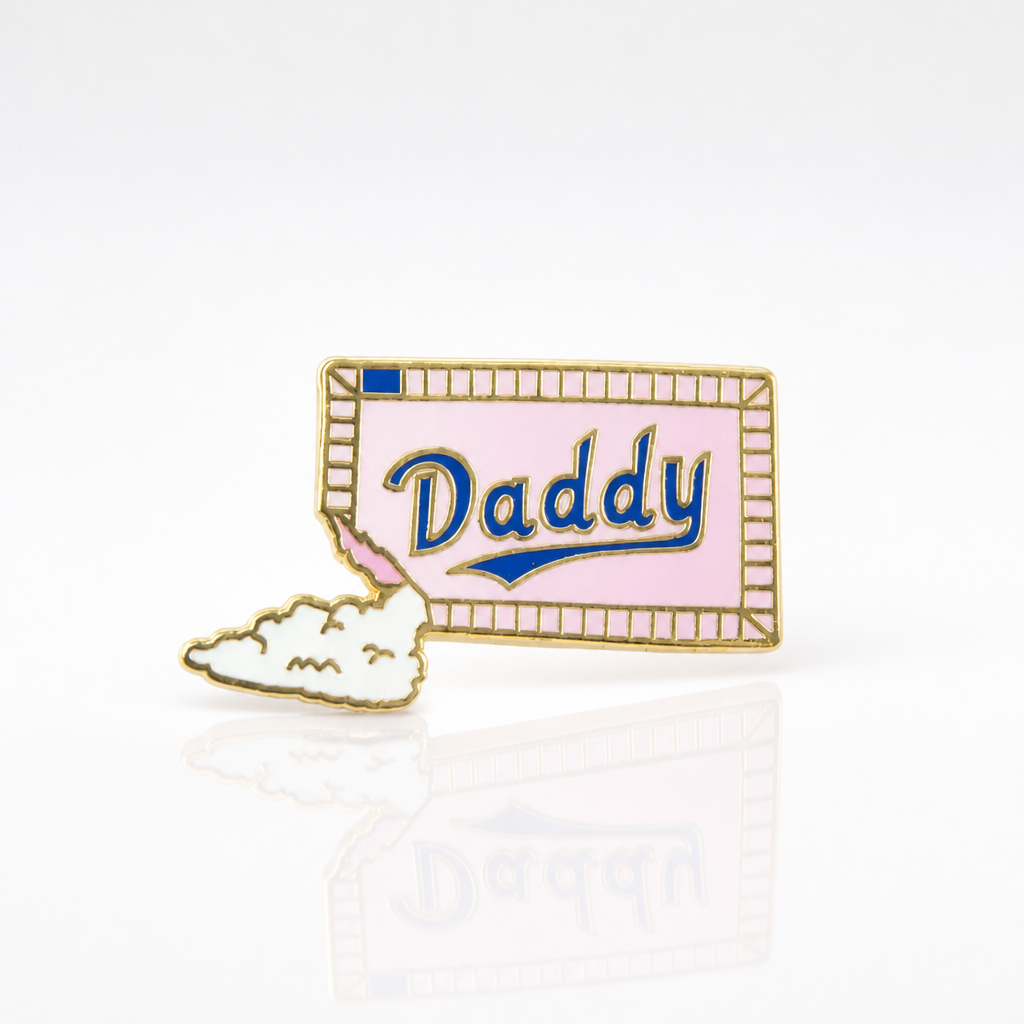 Sugar Daddy enamel pin featuring pastel candy-inspired artwork with gold-tone details