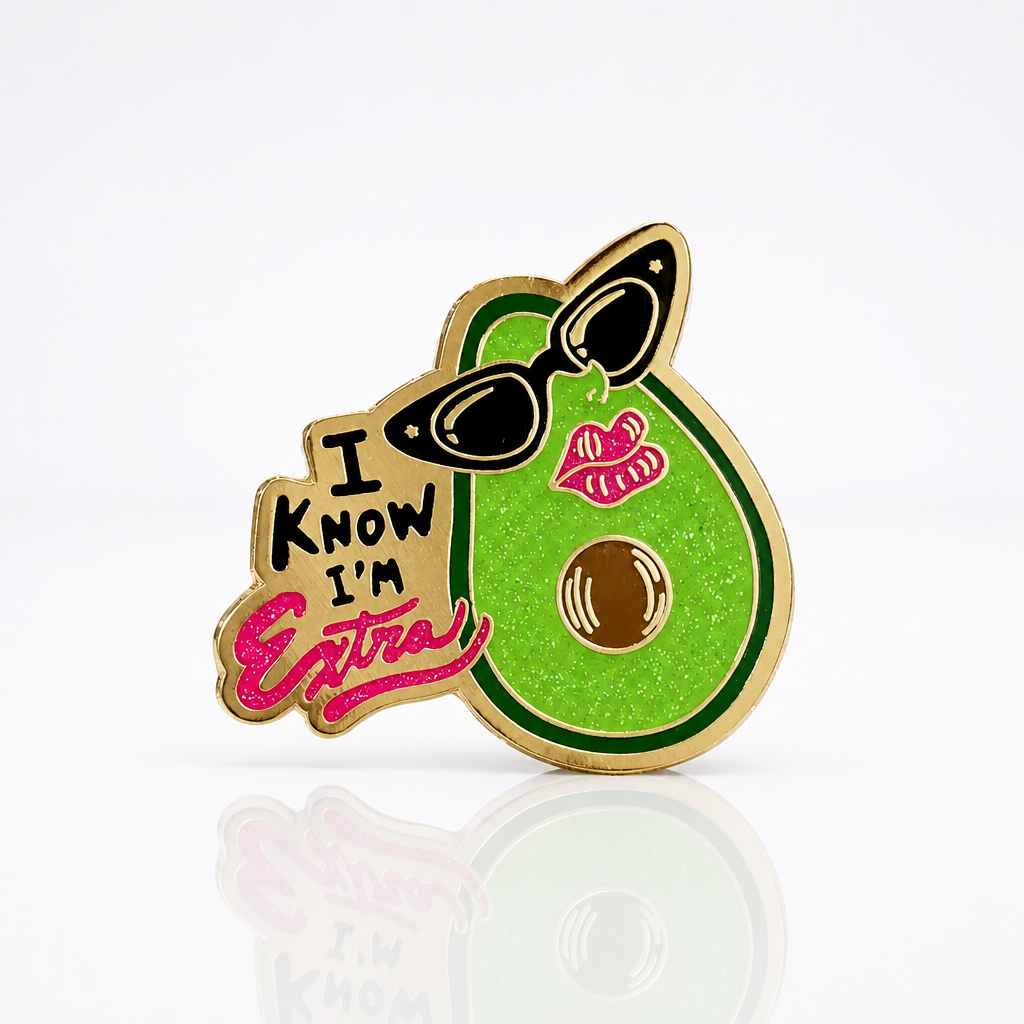Glitter avocado enamel pin wearing sunglasses with the phrase I Know I'm Extra