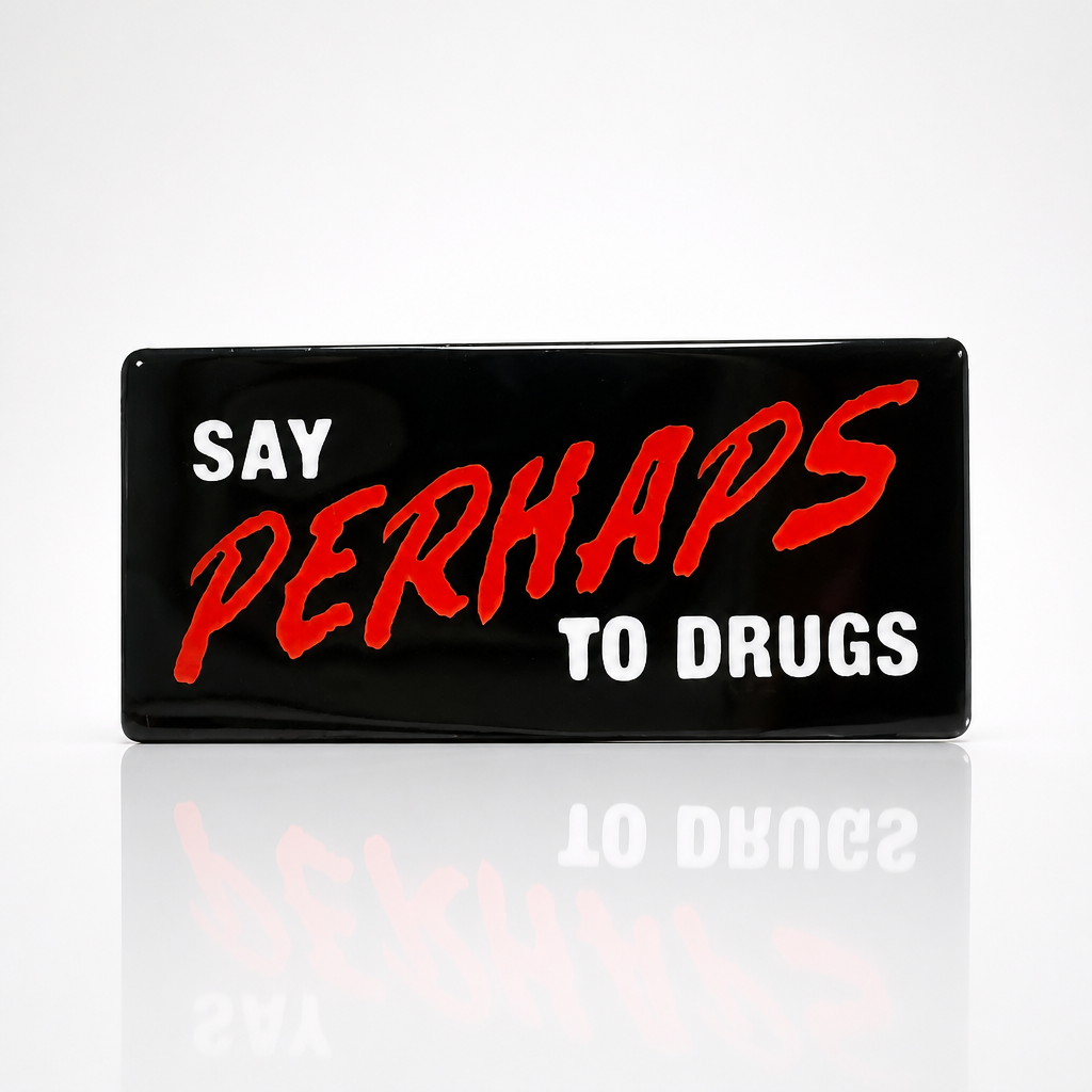 Say Perhaps to Drugs enamel pin featuring bold red and white lettering on a black background