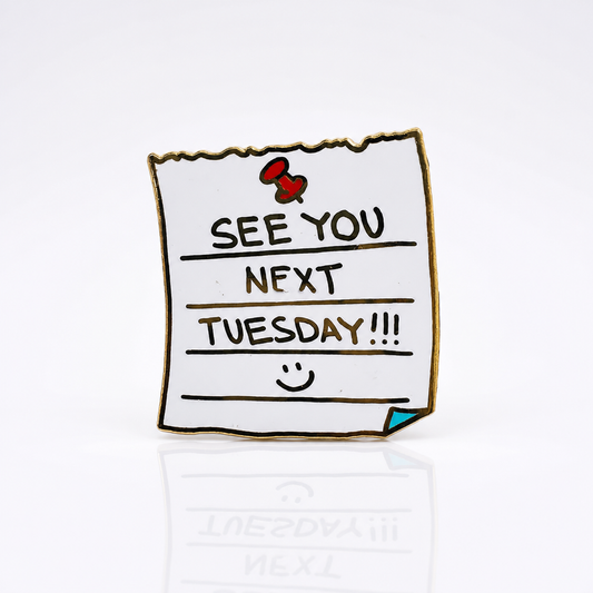 See You Next Tuesday enamel pin featuring a handwritten note design with gold-tone details