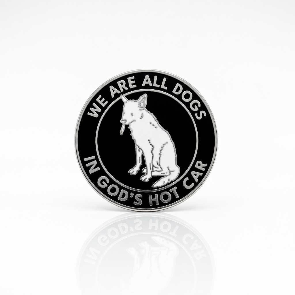 Black and silver hard enamel pin featuring a dog illustration and the phrase We Are All Dogs in God's Hot Car