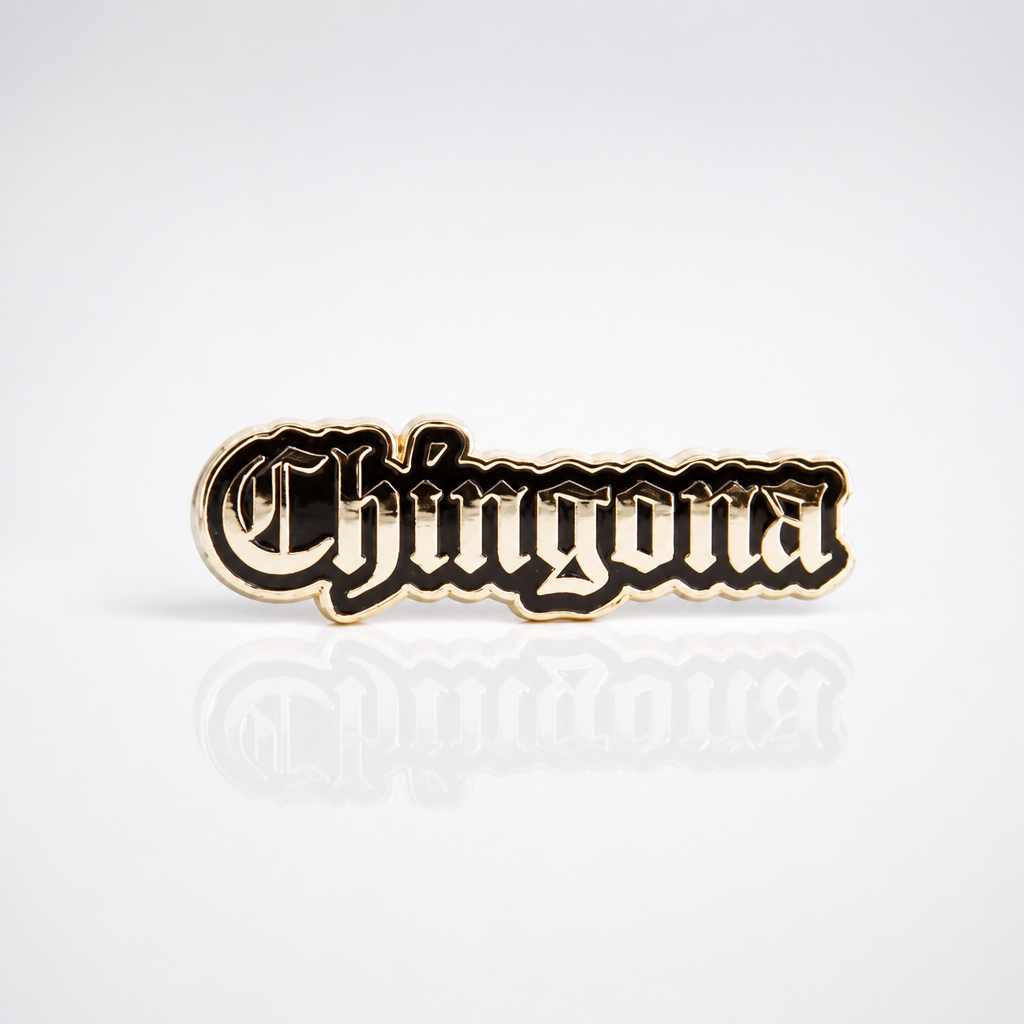 Black and silver Chingona script enamel pin with gothic-style lettering