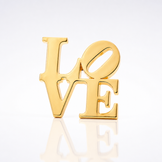 Gold plated LOVE pin inspired by the iconic Robert Indiana artwork featuring the tilted O design