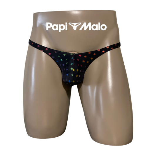 Front view of rainbow star print men’s classic thong on black foil fabric by PapiMalo Gear