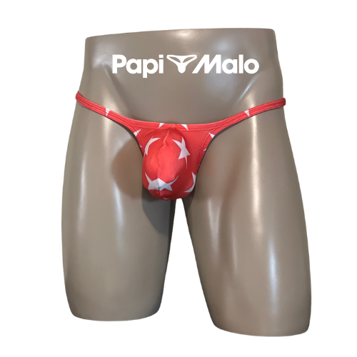 Front view of red star print men’s muscle thong by PapiMalo Gear