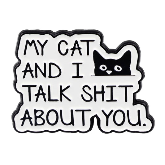 Funny enamel pin featuring black cat and text that says My Cat and I Talk Shit About You
