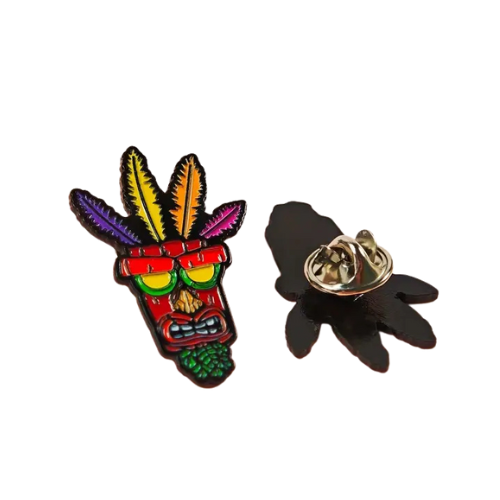 Rainbow Tribal Mask enamel pin with colorful feather detailing and bold stylized artwork