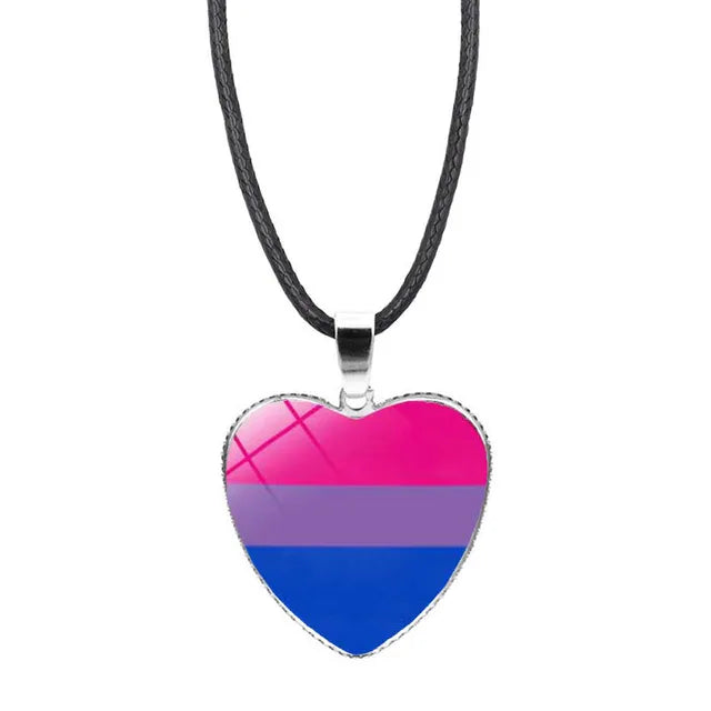 Bisexual pride heart pendant necklace with pink purple and blue flag colors beneath glass heart charm