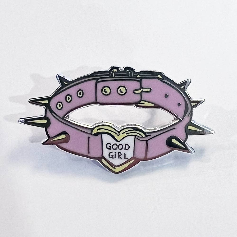 Good Girl Collar enamel pin featuring a pink spiked collar with a heart-shaped charm