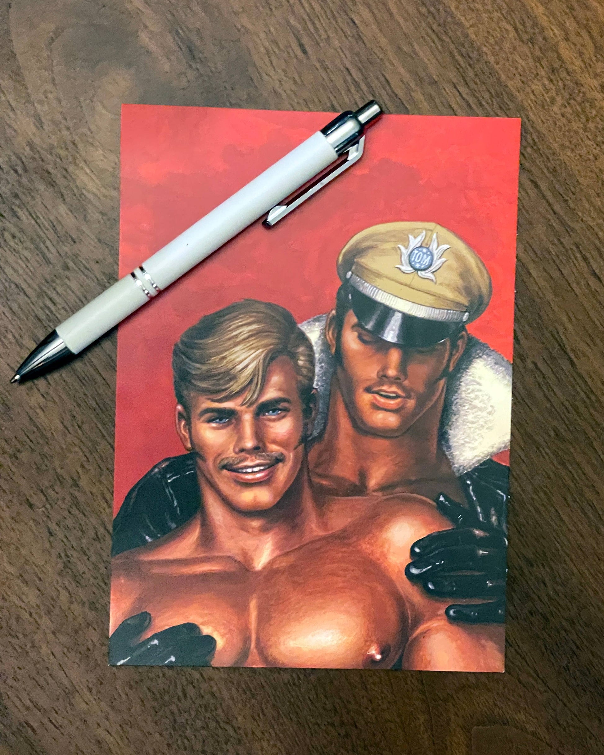 One of the Official Tom of Finland postcard collection featuring eight museum-quality reproductions of the artist's iconic LGBTQ+ illustrations.