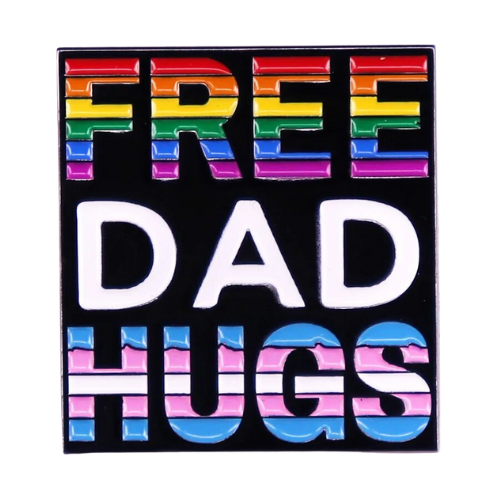 Free Dad Hugs enamel pin with Progress Pride rainbow colors on black background