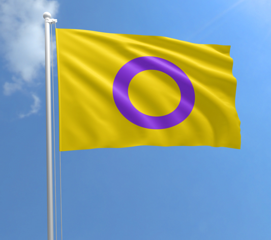 Intersex Pride outdoor flag with yellow background and purple circle symbol against a blue sky