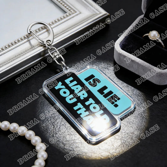 Heated Rivalry acrylic keychain featuring “Liar, Liar Told You That” quote in blue and black design