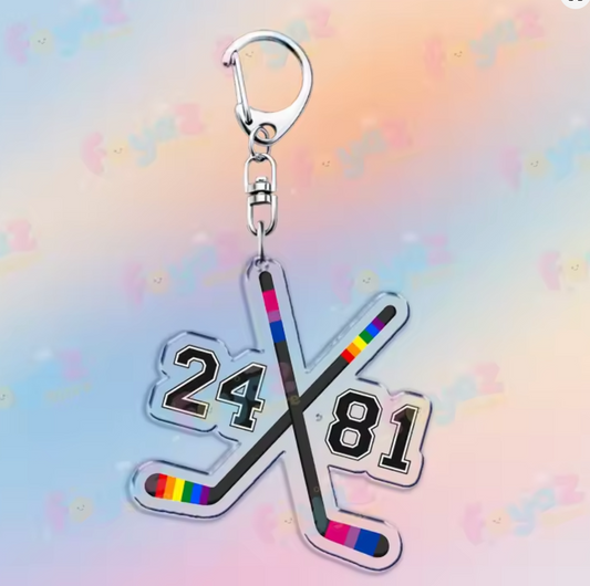 Heated Rivalry acrylic keychain with crossed rainbow hockey sticks and Hollander Rozanov numbers