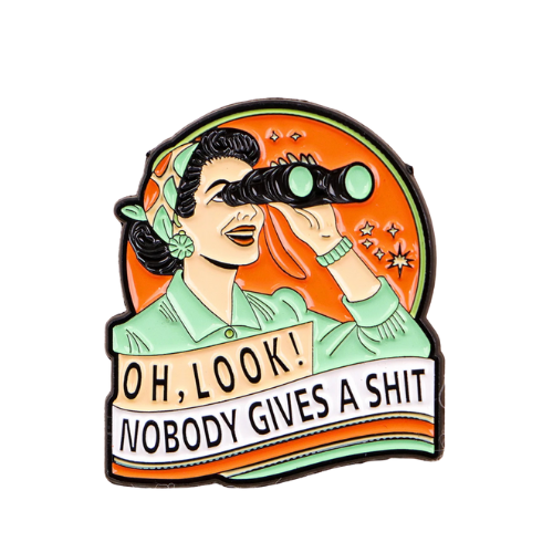 Retro style enamel pin with woman using binoculars and the phrase “Oh Look, Nobody Gives a Shit”