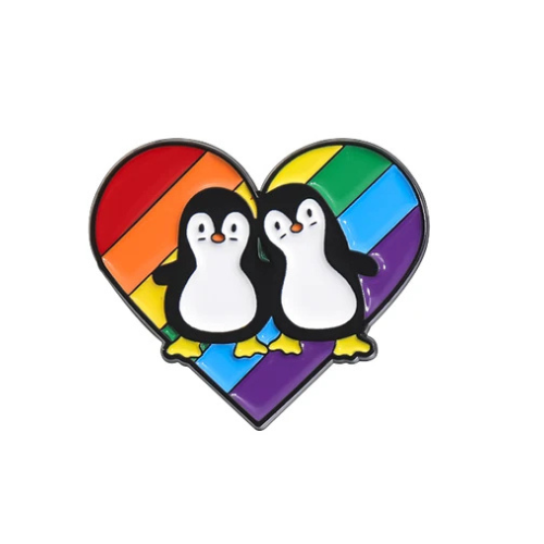 Cute penguin couple enamel pin standing on a rainbow pride heart background