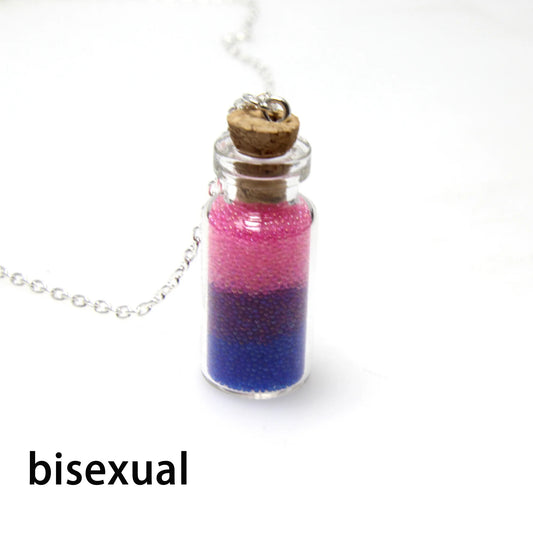 Bisexual pride bottle necklace with layered pink purple and blue micro-beads inside tiny glass bottle pendant