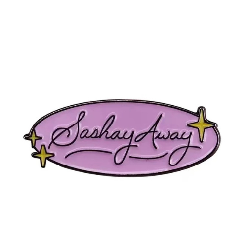 Pastel pink Sashay Away enamel pin with glamorous script lettering and star accents